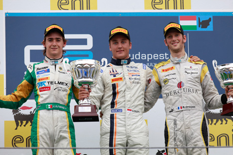 På podiet fra venstre, Esteban Gutiérrez, Stefano Coletti og den mesterskabsførende Romain Grosjean.